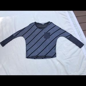 Grey and black striped top by Laila Jayde